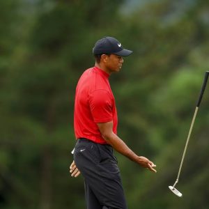 Tiger Woods playing golf. 
